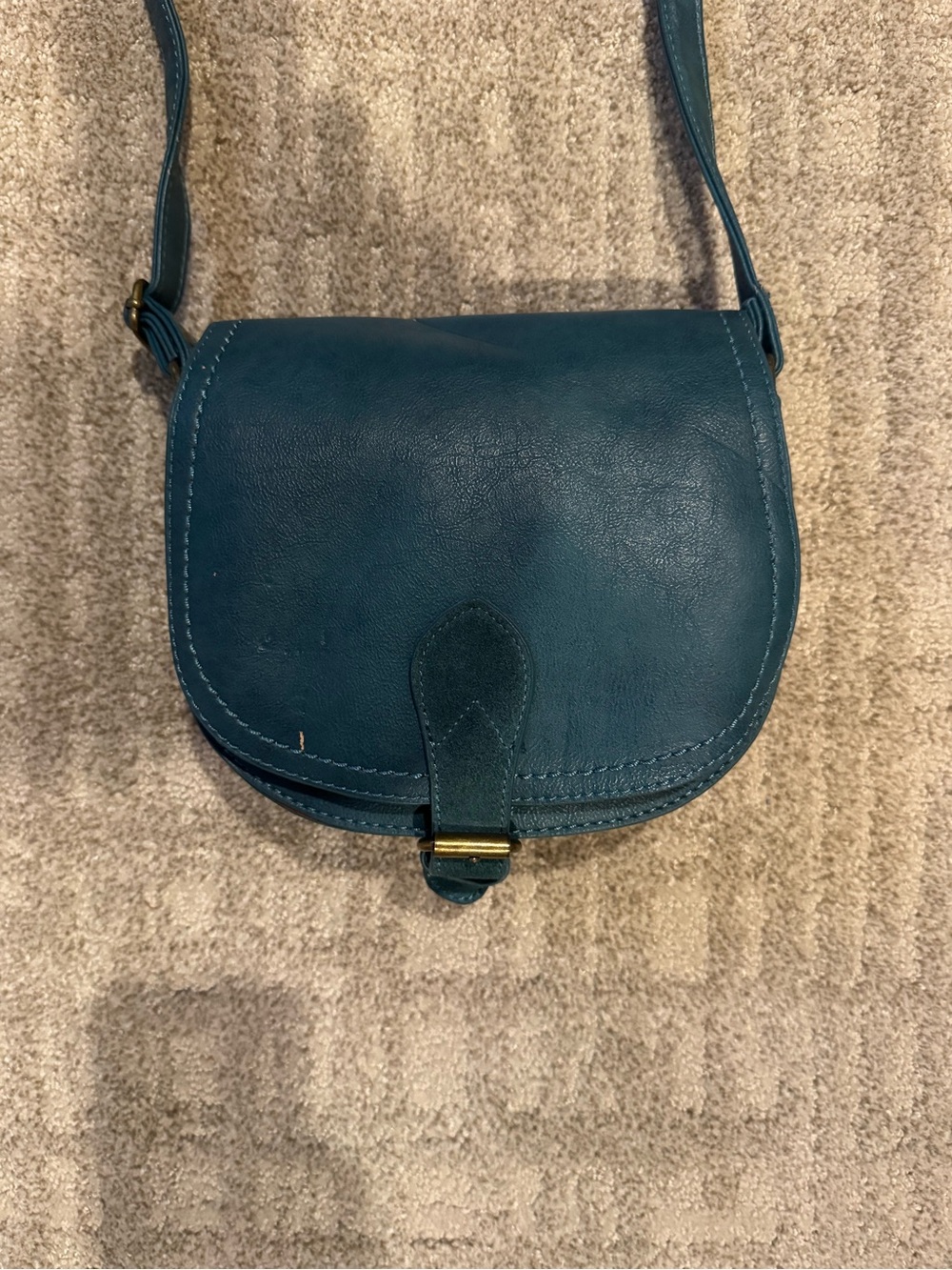 Joy Susan Teal Crossbody Saddle Bag with metal clasp buckle close